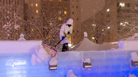 Clearing Snow from Sculpture