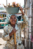 Lady with Basket of Fish