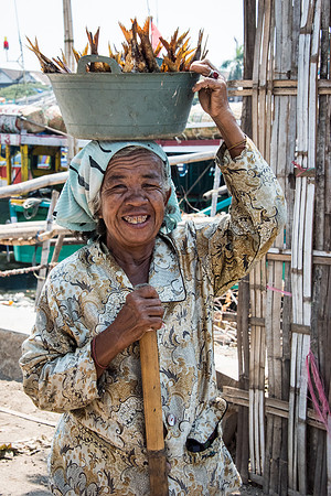 Lady with Basket of Fish