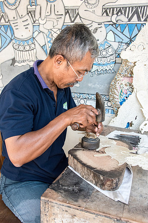 Man making Leather Shadow Puppets -1