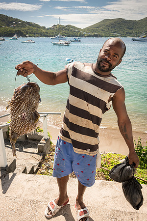Fisherman with Puffer Fish