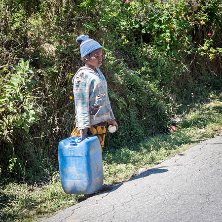 Child with Water Container